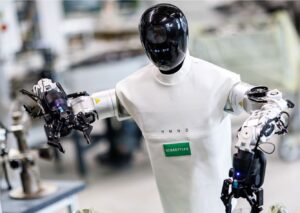 Schaeffler humanoid robot HMND 01 with two manipulators on a factory floor